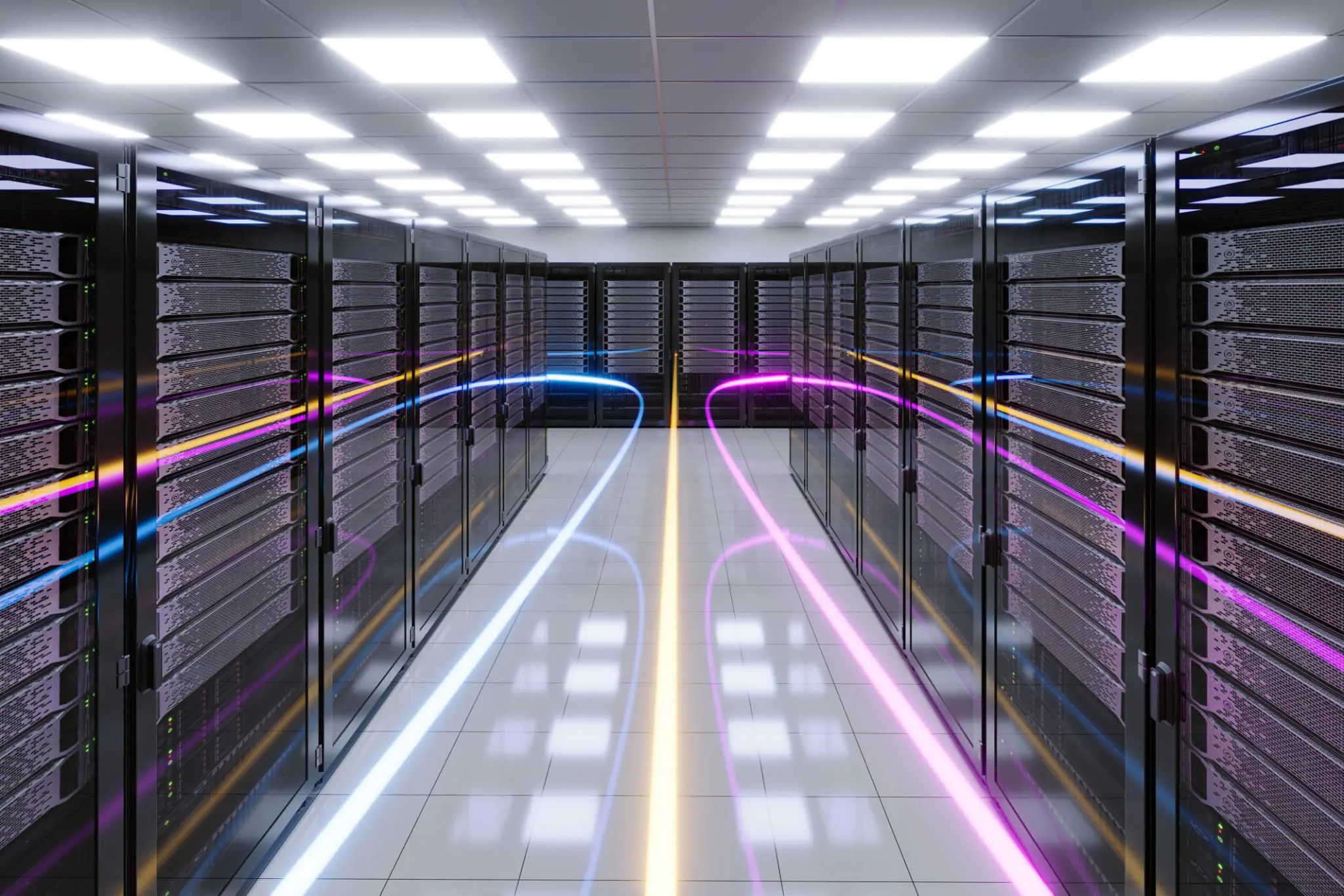 Data center with glowing fiber optic cables.